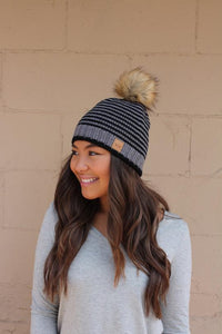 Black and grey strip hat with pom