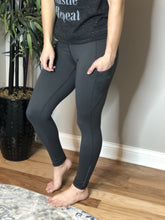 Load image into Gallery viewer, Compression work out pants with reflective detail and side pocket