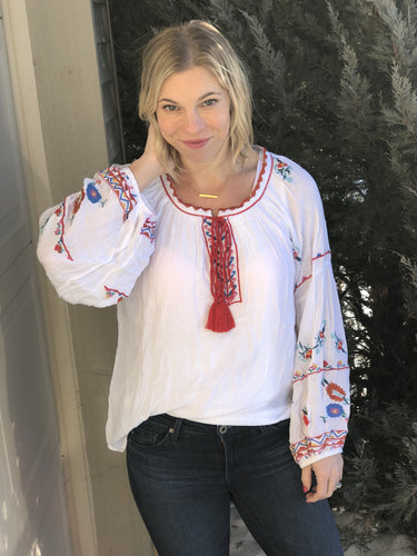 Emboidered long sleeve white top