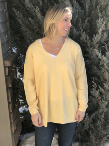 Soft yellow sweater with center seam
