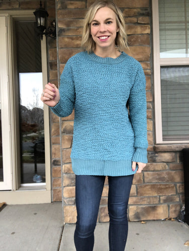 Teal popcorn pullover.